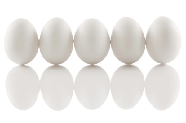 Four chicken eggs — Stock Photo, Image