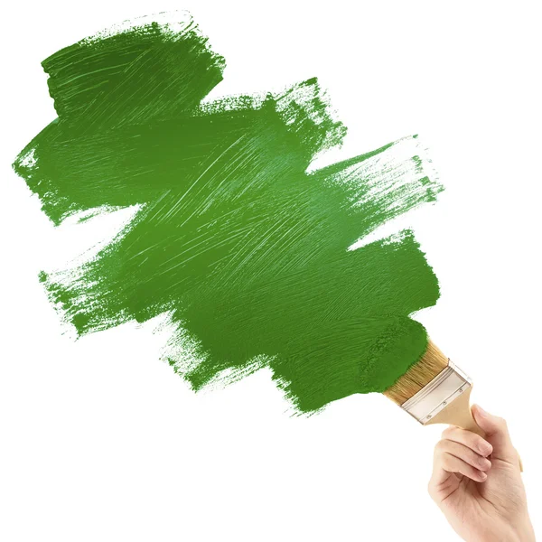 Malerei mit grünem Pinsel — Stockfoto