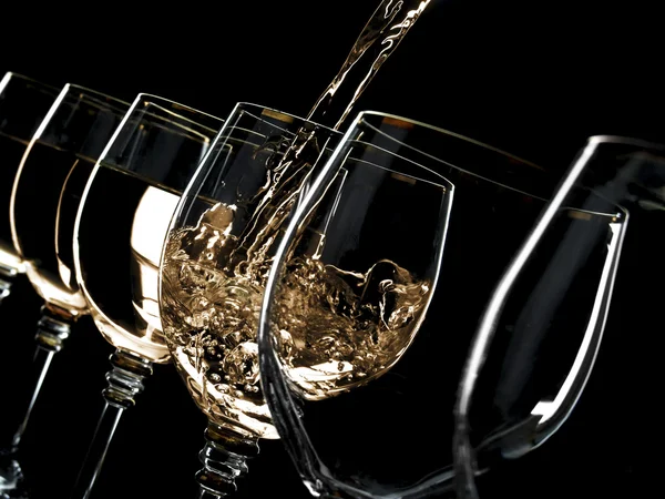 Wine pouring into glasses — Stock Photo, Image