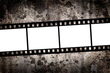 Blank film over grungy background clipart