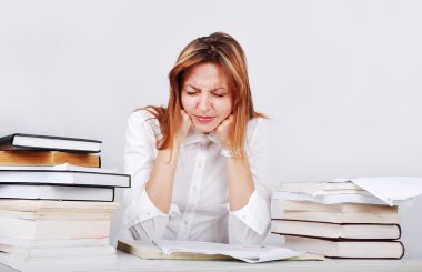 Young female model sitting on desk with clipart