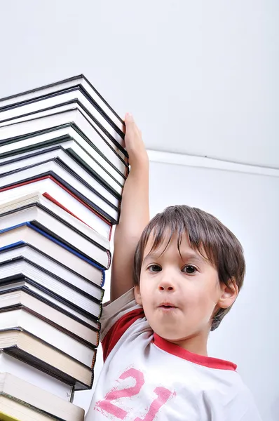 A big tower of many books vertical and — Stock Photo, Image