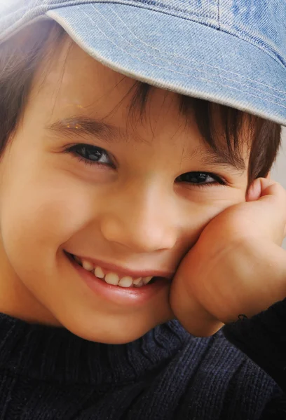 Boy with denim cap Royalty Free Stock Images