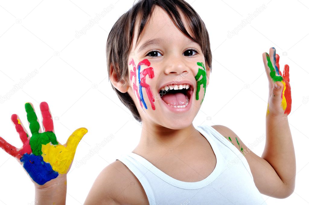 Five year old boy with hands painted i