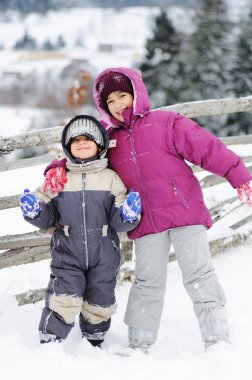 Young beautiful girl and boy outdoor i clipart