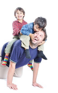 Happy young father with his children clipart