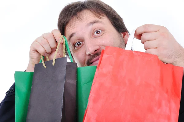 Young man with bags for shopping — Stock Photo, Image