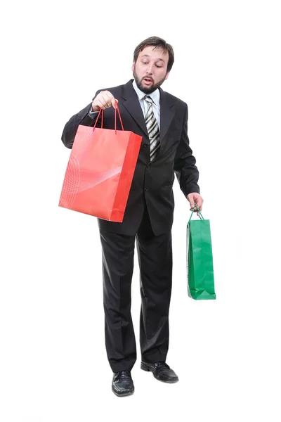 Jovem empresário com sacos de compras — Fotografia de Stock