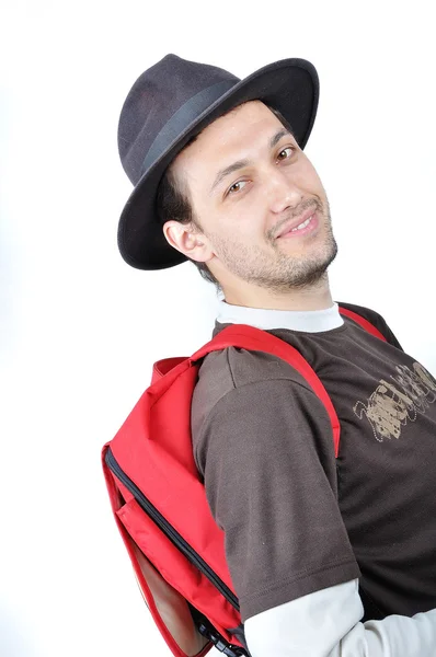 Genç adam şapka ve sırt çantası — Stok fotoğraf