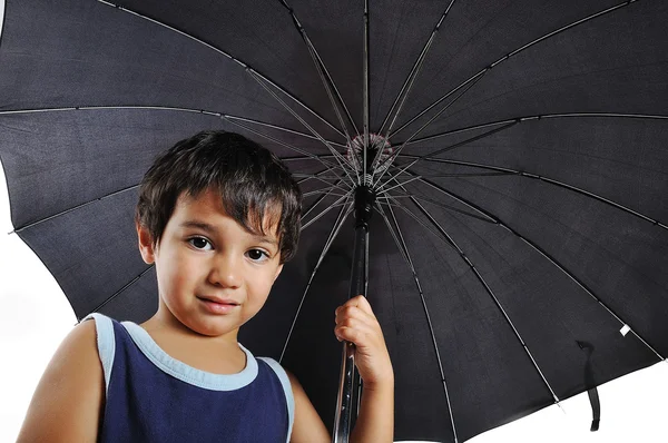 Bambino molto carino con ombrello, isolato — Foto Stock