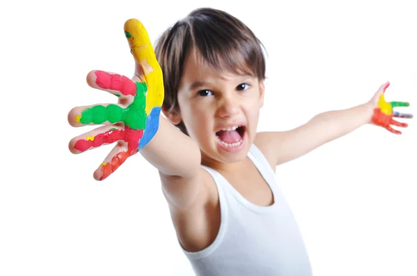Uma criança fofa com cores no branco — Fotografia de Stock