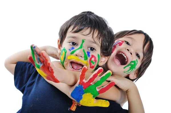 Uma criança fofa com várias cores — Fotografia de Stock
