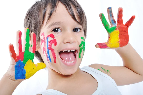 Malé roztomilé dítě s několika barvami — Stock fotografie