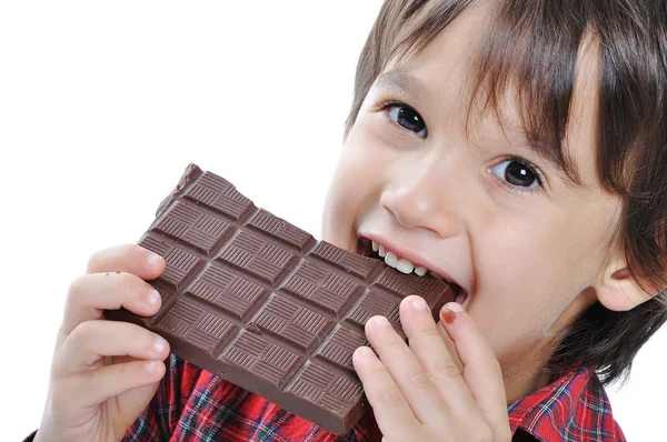 Very cute kid with chocolate, isolated — Stock Photo, Image
