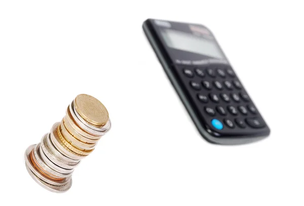 Coins tower and calculator isolated Stock Picture