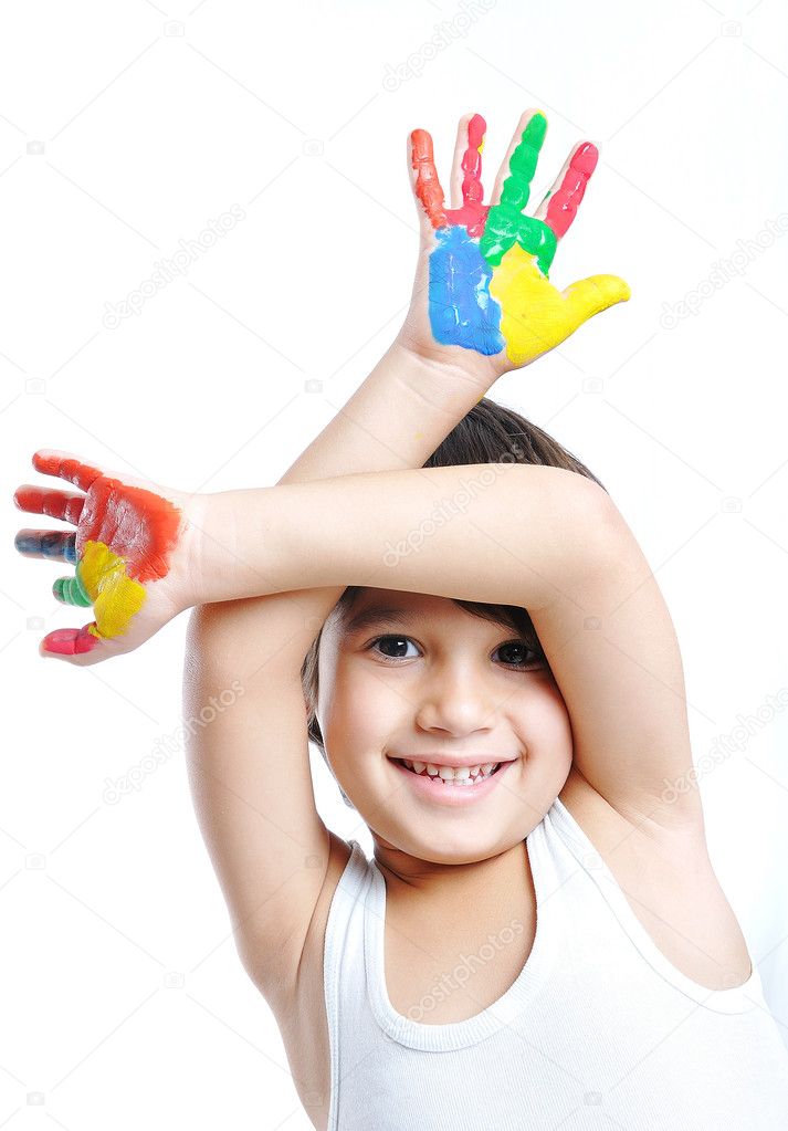 A little cute child with colors on white