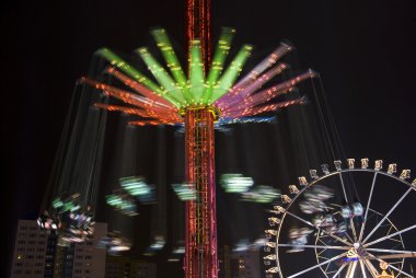 Carousel in amusement park clipart