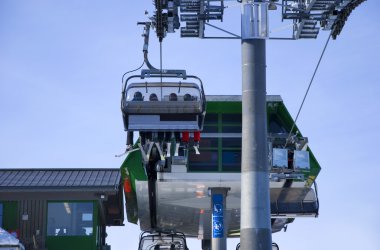 Skiing in ski lift clipart