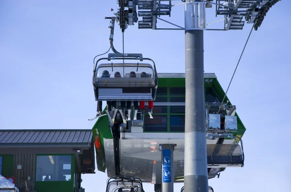 Skiing in ski lift — Stock Photo, Image