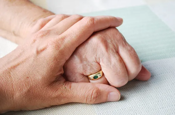 Old and young hand — Stock Photo, Image