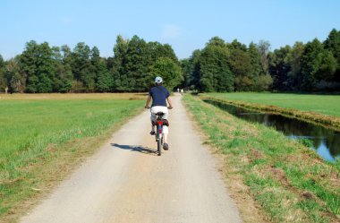 Woman biking clipart