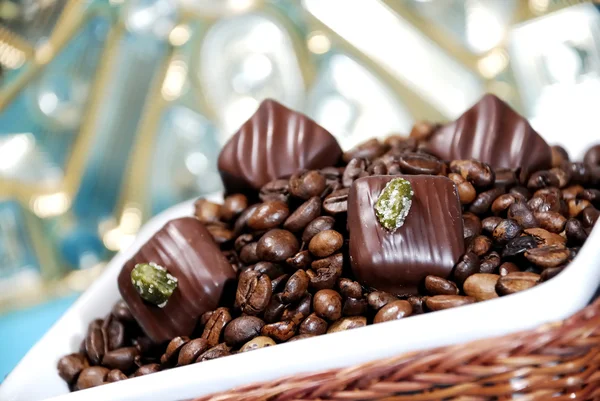 Coffee beans with chocolates — Stock Photo, Image