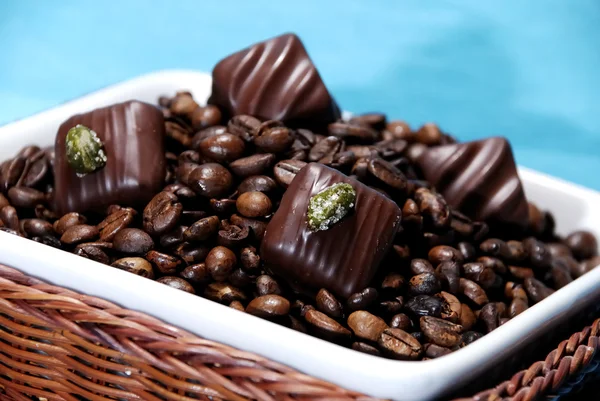 Coffee beans with chocolates — Stock Photo, Image
