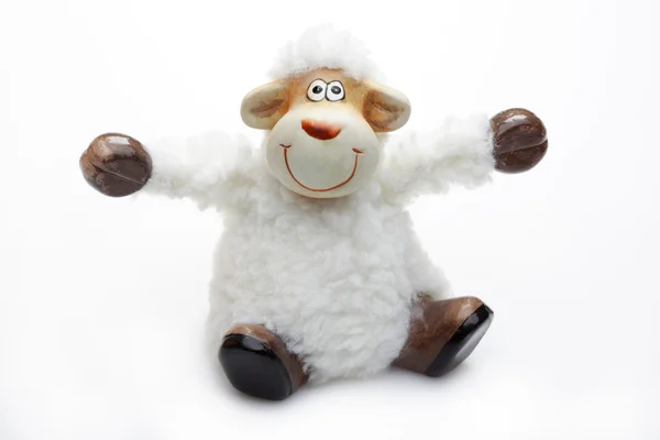 Smiling sheep toy over white — Stock Photo, Image