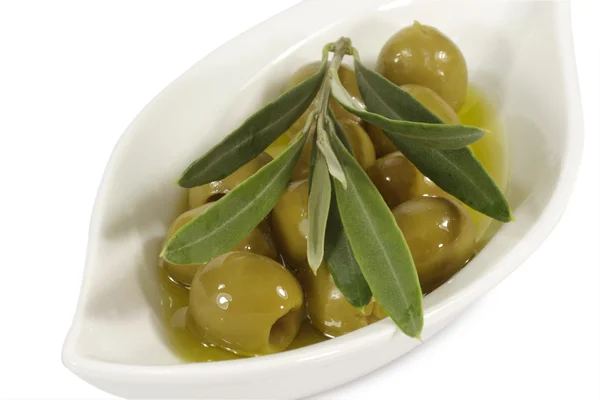 Green olives in olive oil — Stock Photo, Image