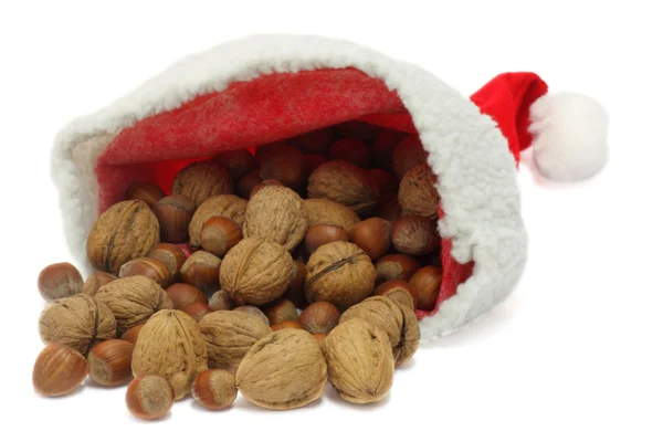 Santa hat with nuts — Stock Photo, Image