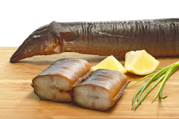 Preparation of smoked eel — Stock Photo, Image