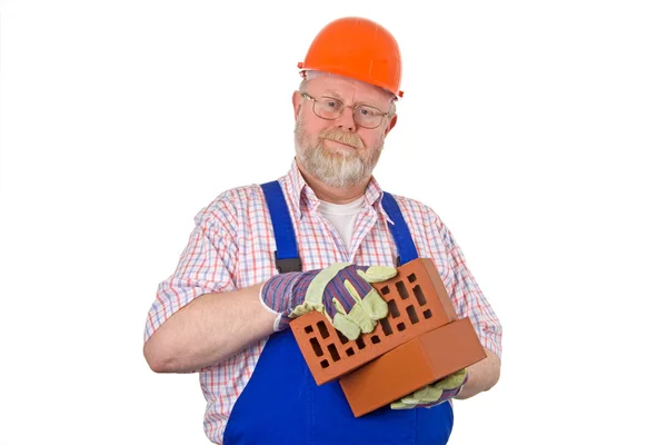 Bricklayer with bricks — Stock Photo, Image