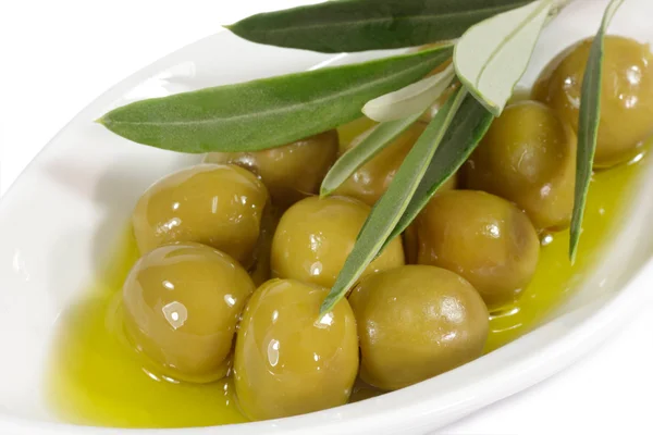 Olivy v olivovém oleji — Stock fotografie