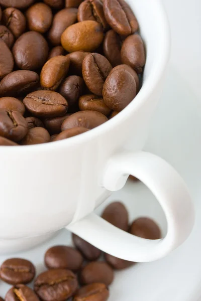 stock image Cup coffee beans background