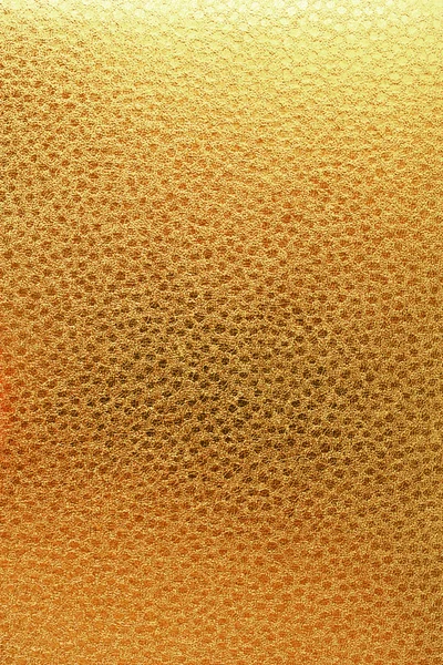 Textura de cuero repujado en oro —  Fotos de Stock