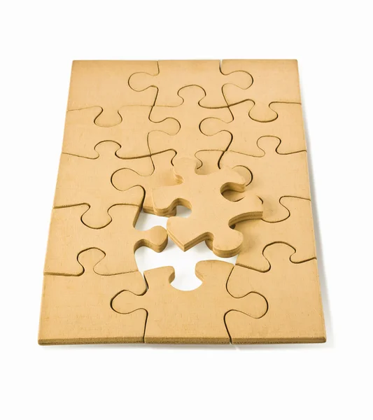 Wooden puzzles — Stock Photo, Image