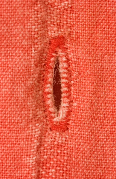 Peça vermelha de dobradiças de roupas — Fotografia de Stock