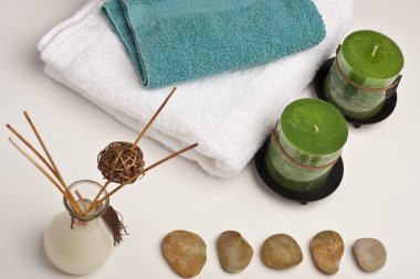 Spa candles, fragrance and towels clipart