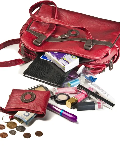 Cosas necesarias en el bolso de mujer roja Imagen De Stock