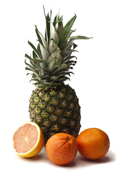 Pineapple, oranges and grapefruit — Stock Photo, Image