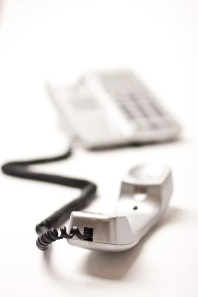 Silvery telephone on table — Stock Photo, Image