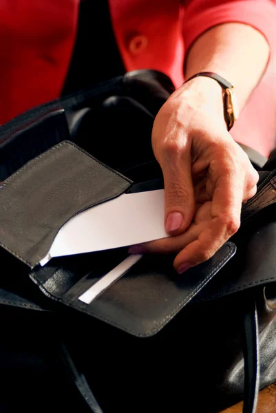 stock image Woman hand looking in bag