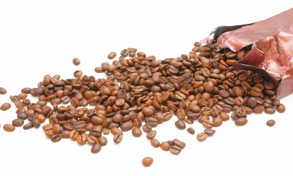 Пролитые кофейные зёрна — стоковое фото