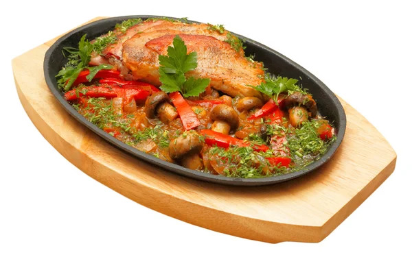 Roastpig with vegetables and mushrooms — Stock Photo, Image