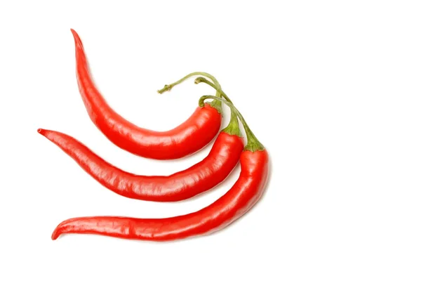Drie rode chilipepers — Stockfoto