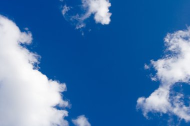 Blue sky with white clouds clipart