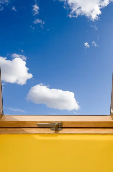 Window and bue sky with white clouds — Stock Photo, Image