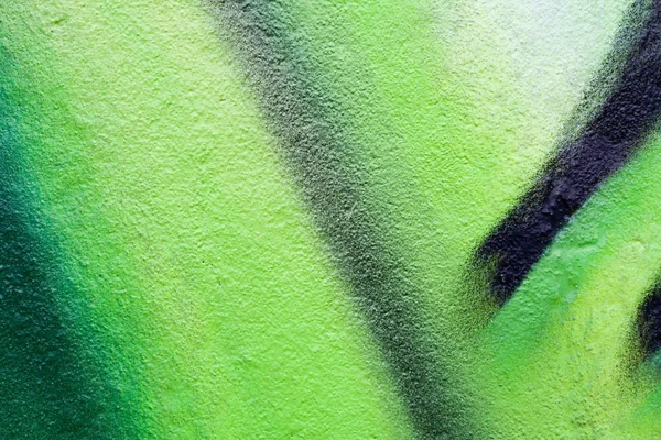 Zelená graffiti pozadí nebo textury — Stock fotografie
