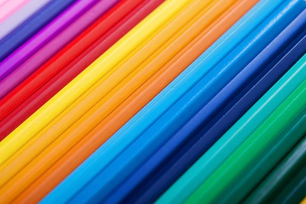 Kleurrijke potloden - achtergrond — Stockfoto