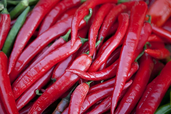 Hot Red peppers background — Stock Photo, Image